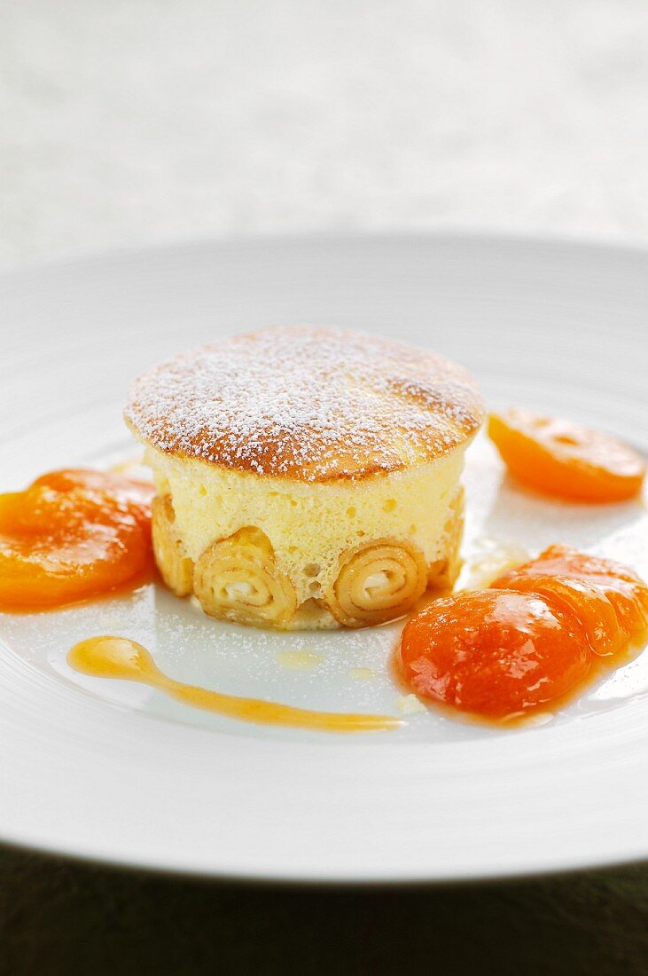 Austrian cheese-filled pancake soufflé with roasted apricots