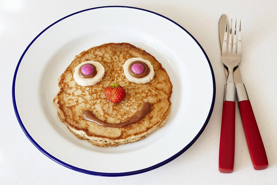 A pancake with a funny face
