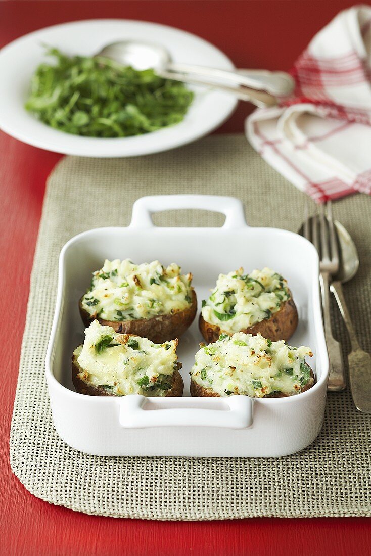 Jacket potatoes with a spring onion and cheese filling