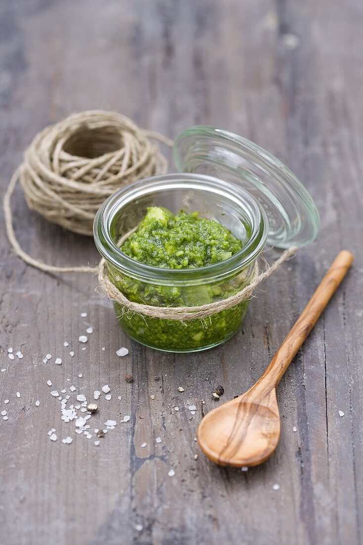 A jar of pesto and a ball of kitchen twine