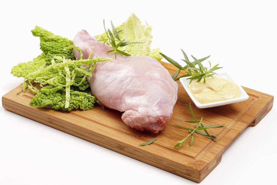 Ingredients for rabbit leg with savoy cabbage