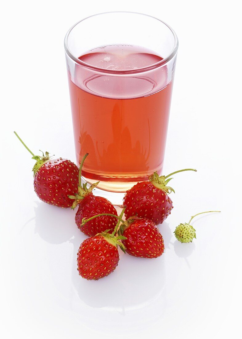 A glass of strawberry spritzer