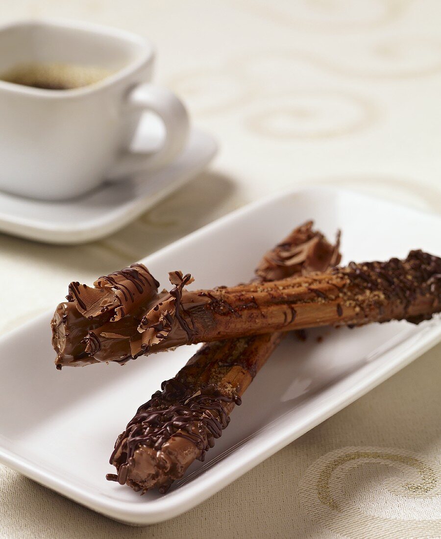 Chocolate Cinnamon Sticks on a White Plate