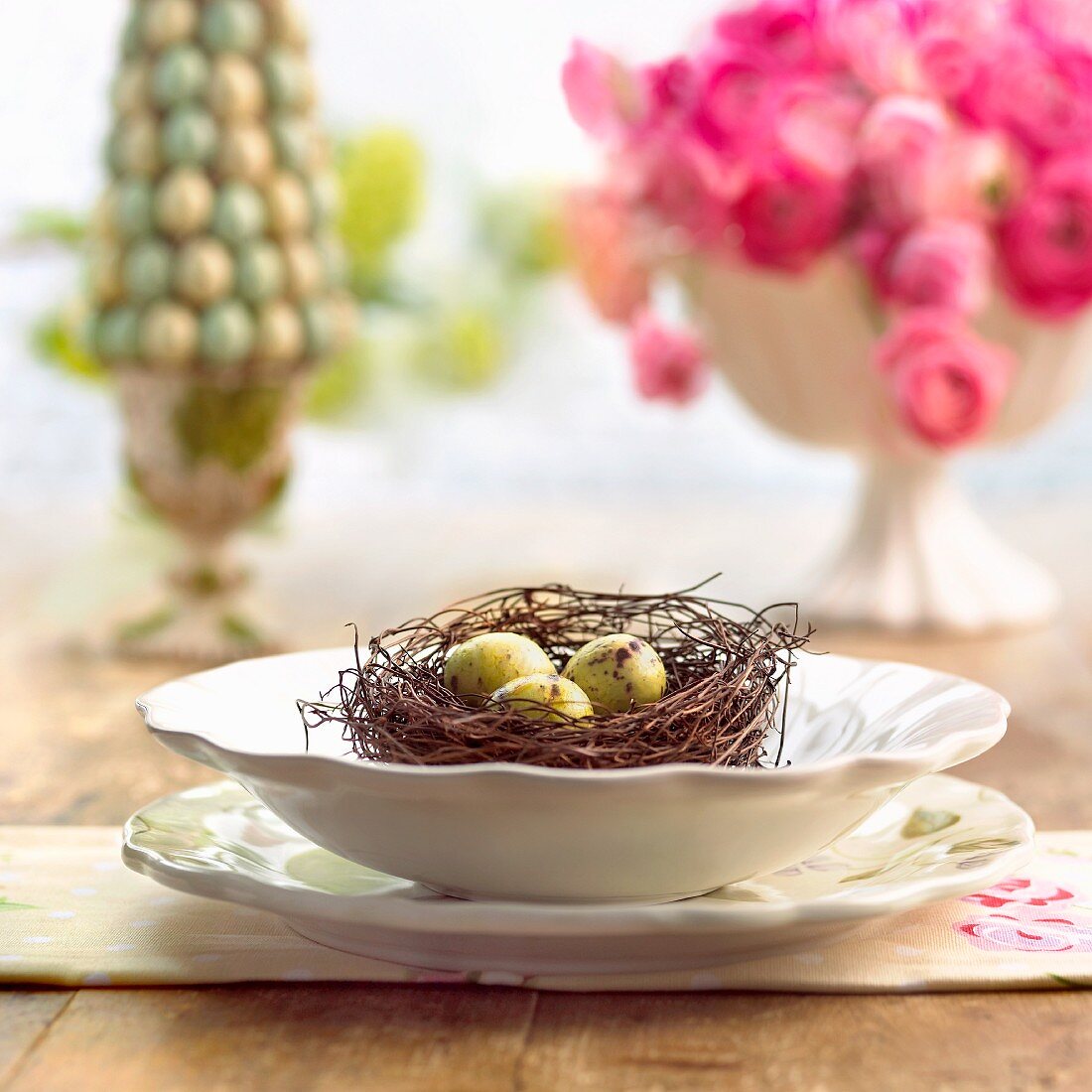 Decorative Nest with Eggs on Easter Table