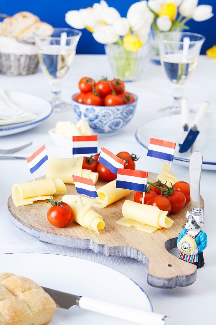 A cheese platter decorated with Dutch flags