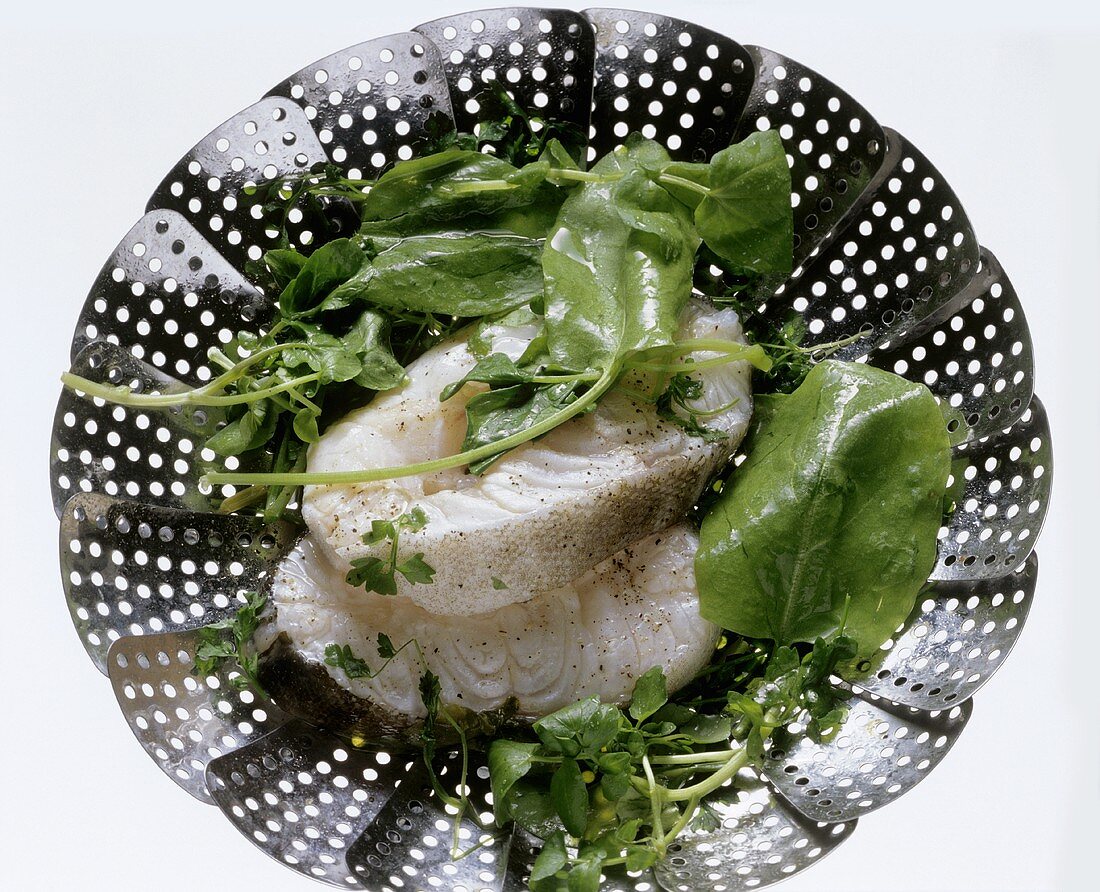 Whole cod & greens in a steamer