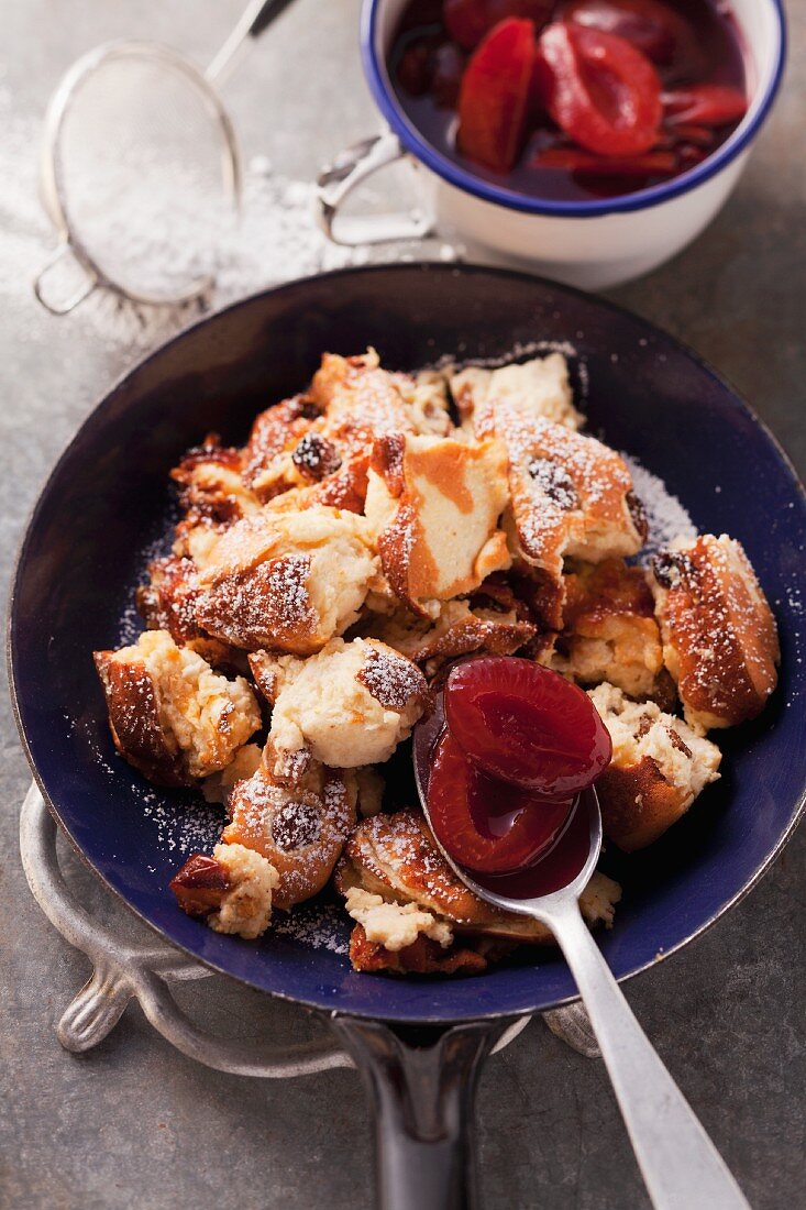 Shredded quark pancakes with roasted damsons