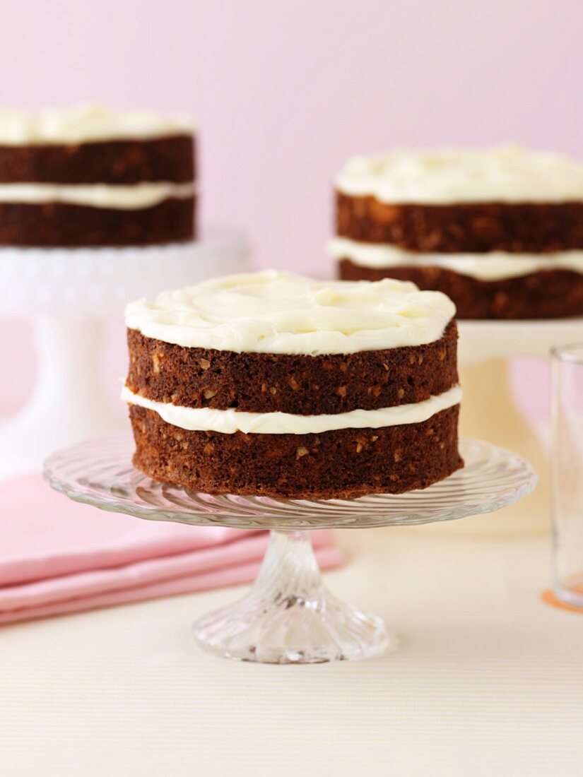 Carrot cakes with a cream cheese topping