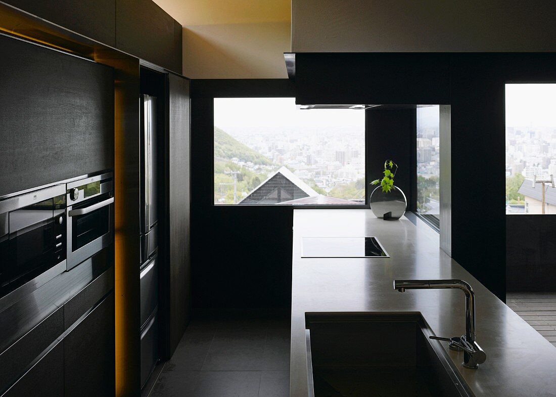 Modern open-plan kitchen with a view