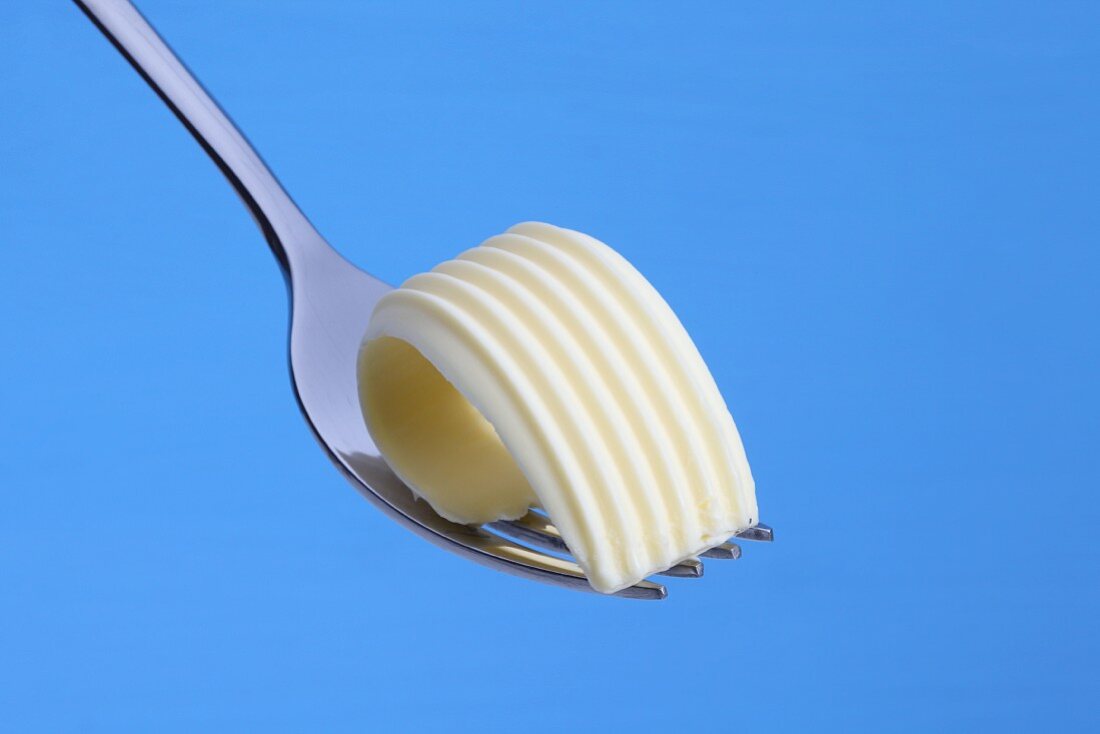 A curl of butter on a fork
