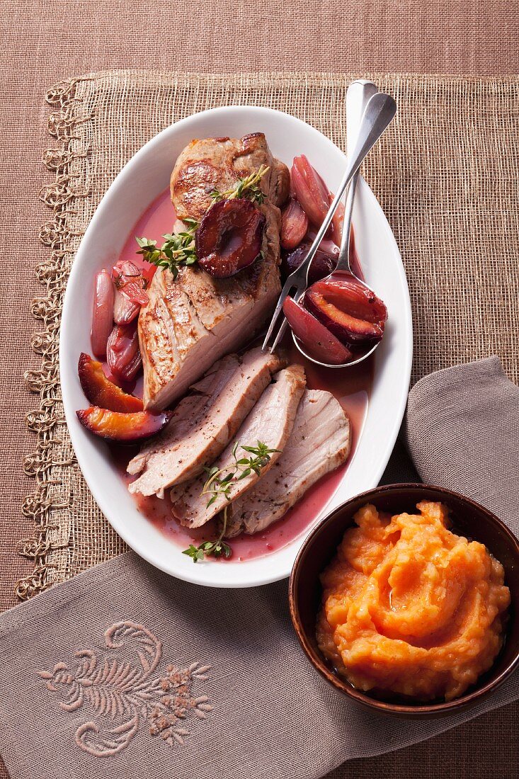 Pork fillet with roasted damsons and mashed squash