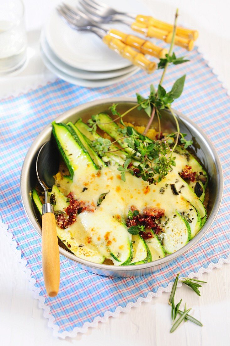 Courgette polenta with herbs and sundried tomatoes