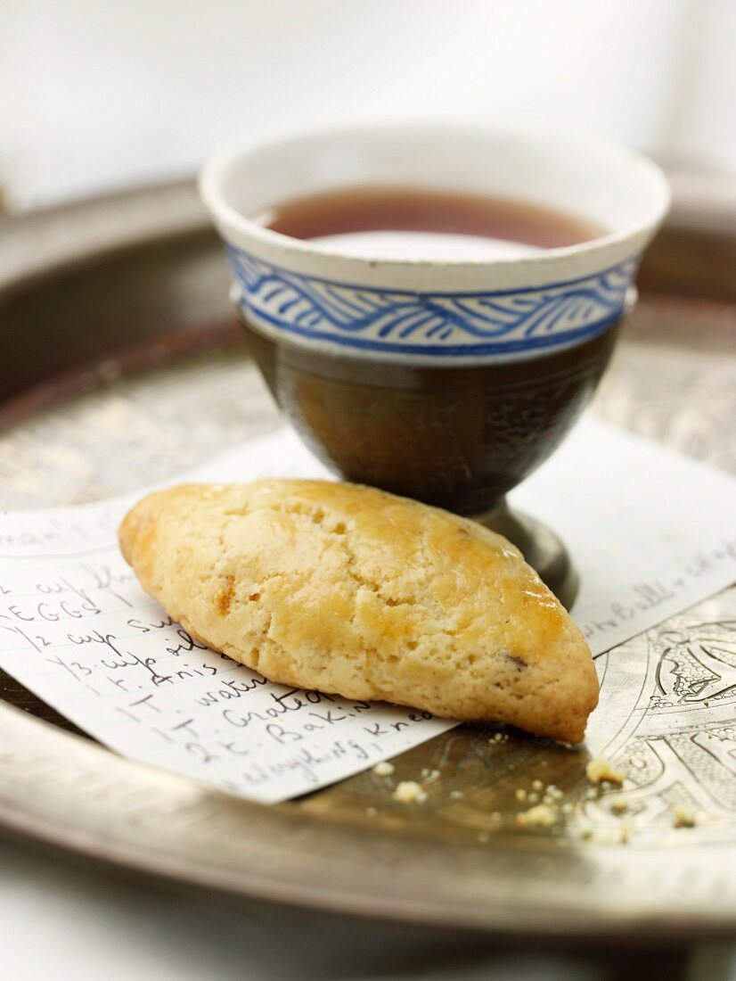 Homemade Anise Cookie with Recipe Card and Cup of Tea