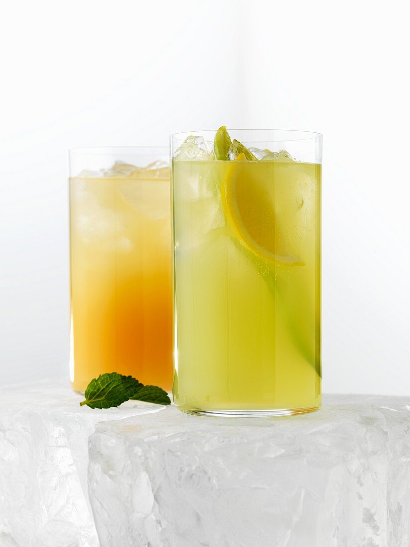 Two citrus fruit drinks