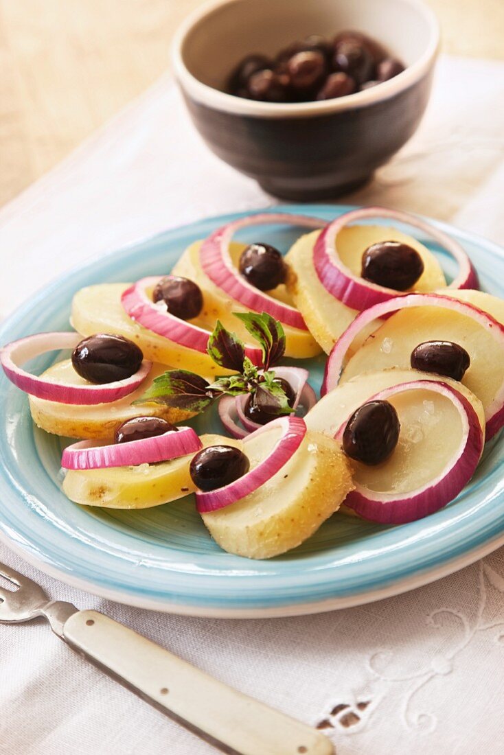 Potato salad with olives and onions
