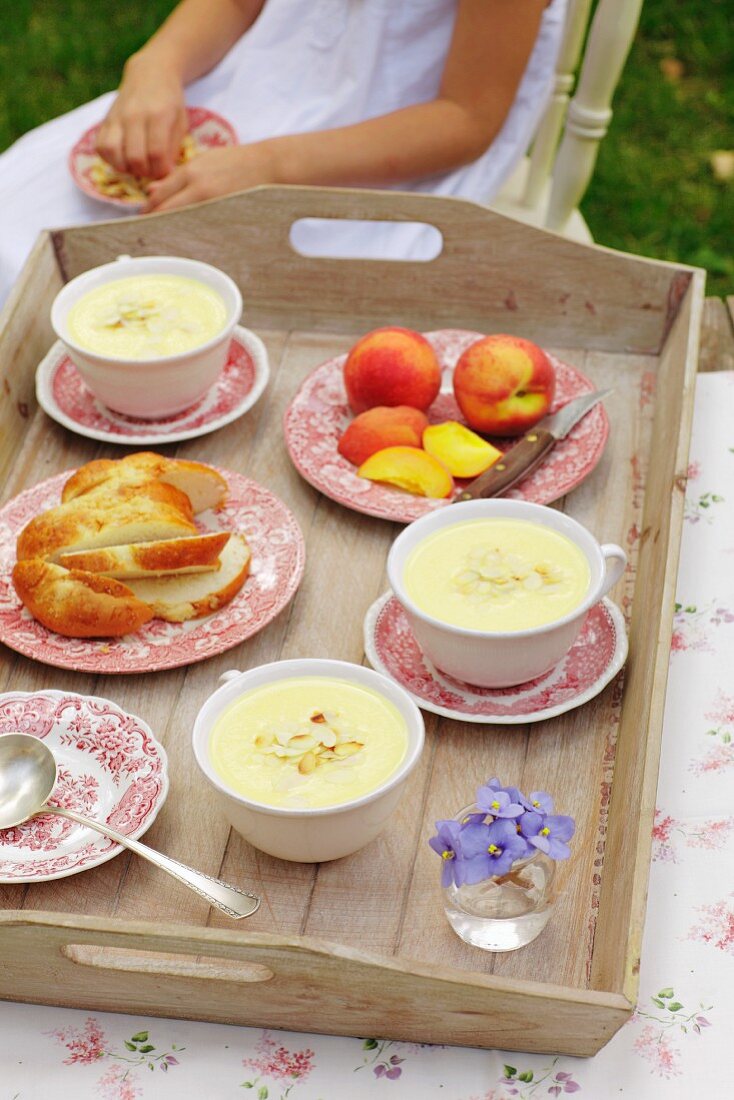 Peach and yoghurt soup with slivered almonds
