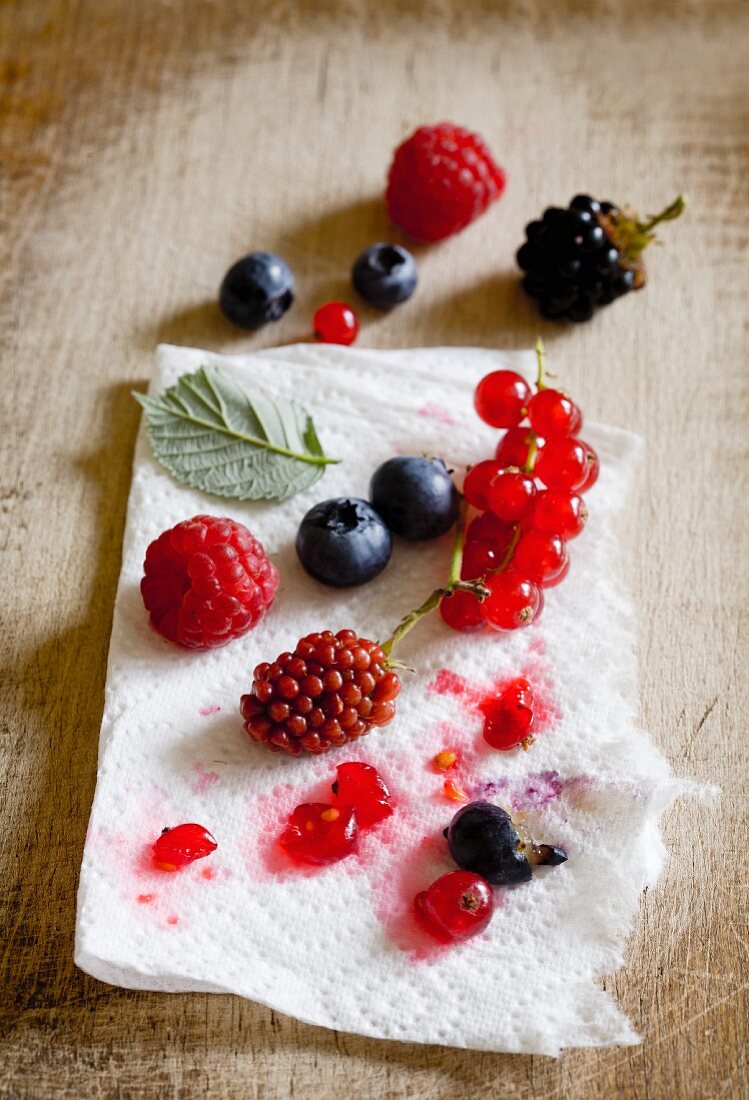 Various berries on a piece of kitchen paper