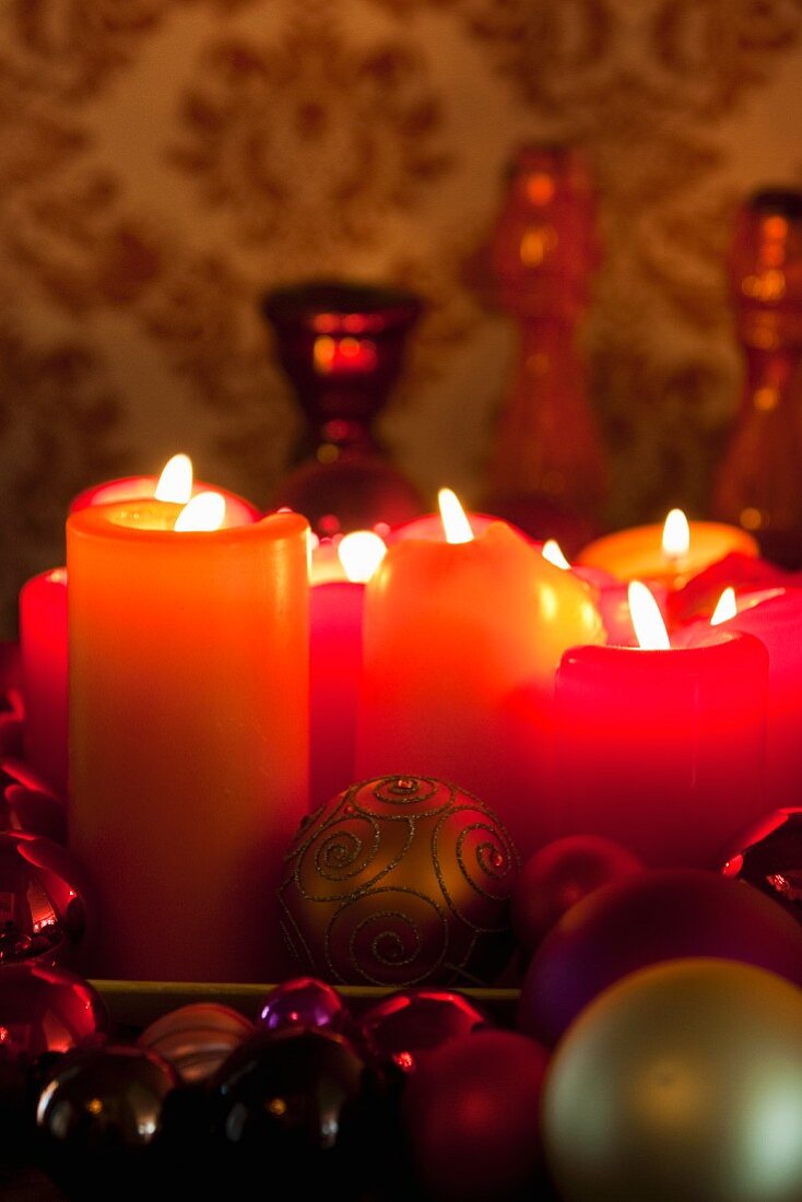 Candles and Christmas tree baubles