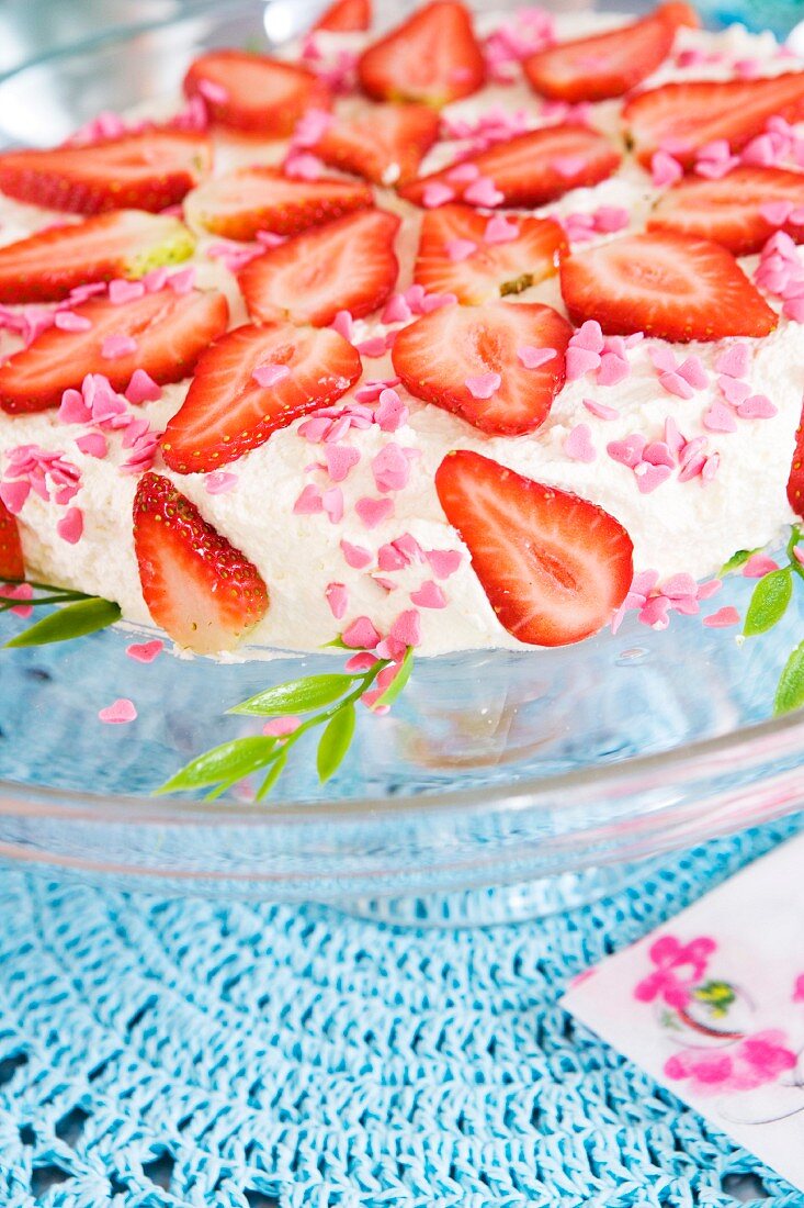 Strawberry tart on a cake stand