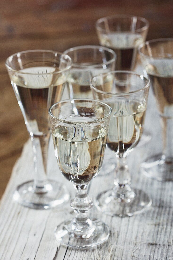 Schnapps glasses on a wooden table