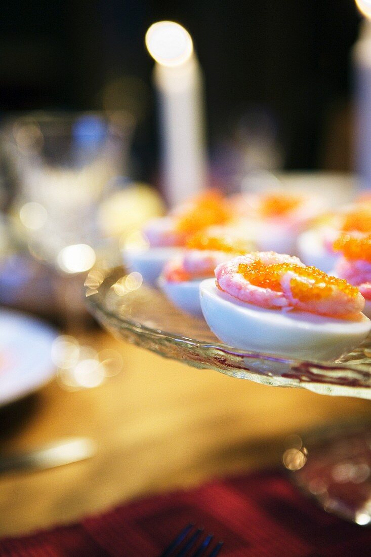 Stuffed eggs with prawns and caviar