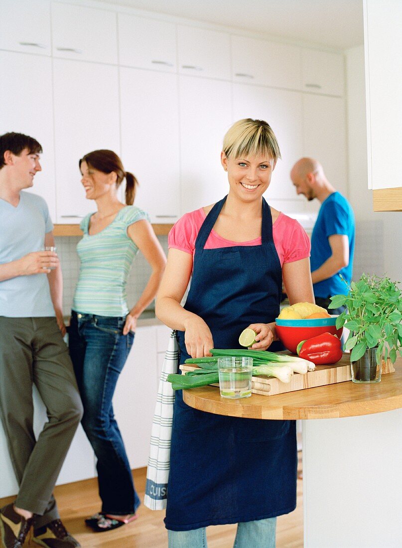 Two couples in a kitchen