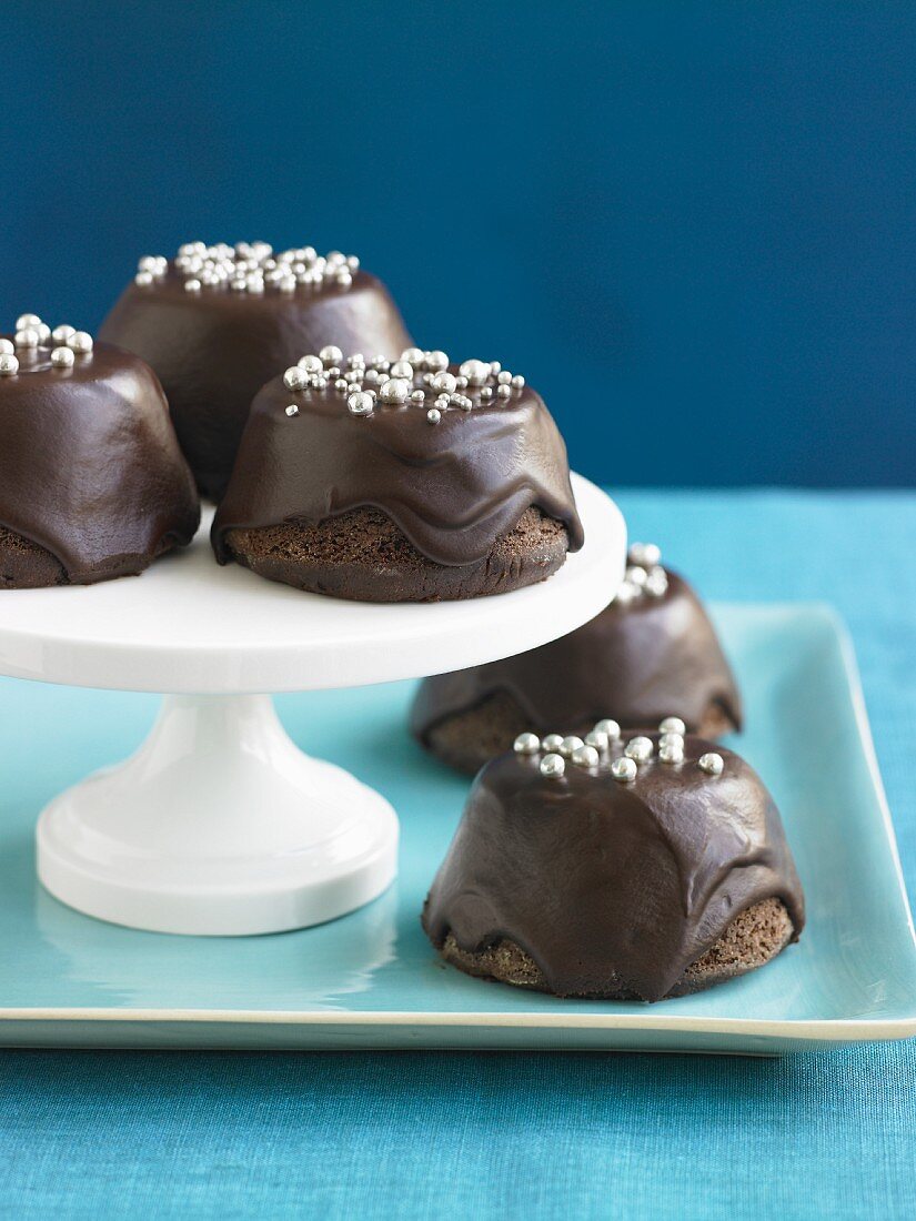 Chocolate Covered Upside Down Cupcakes With Silver Ball Decorations