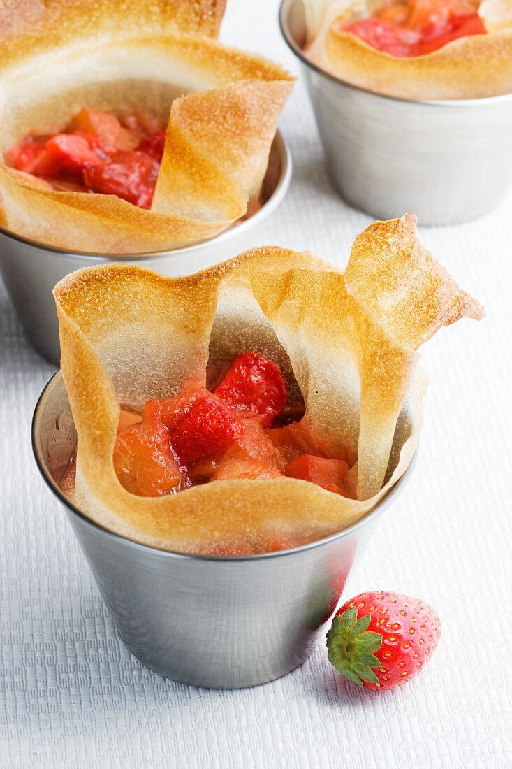 Puff pastry bowls with strawberry and rhubarb compote