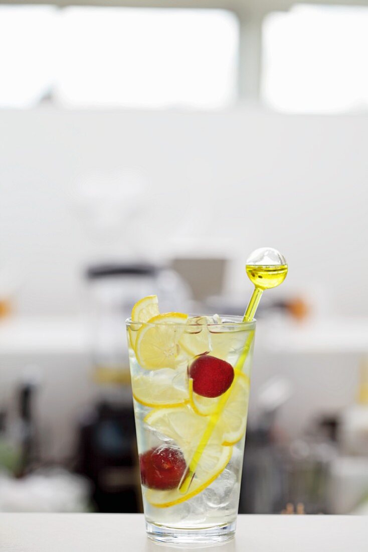 Vodka and lemonade with cherries