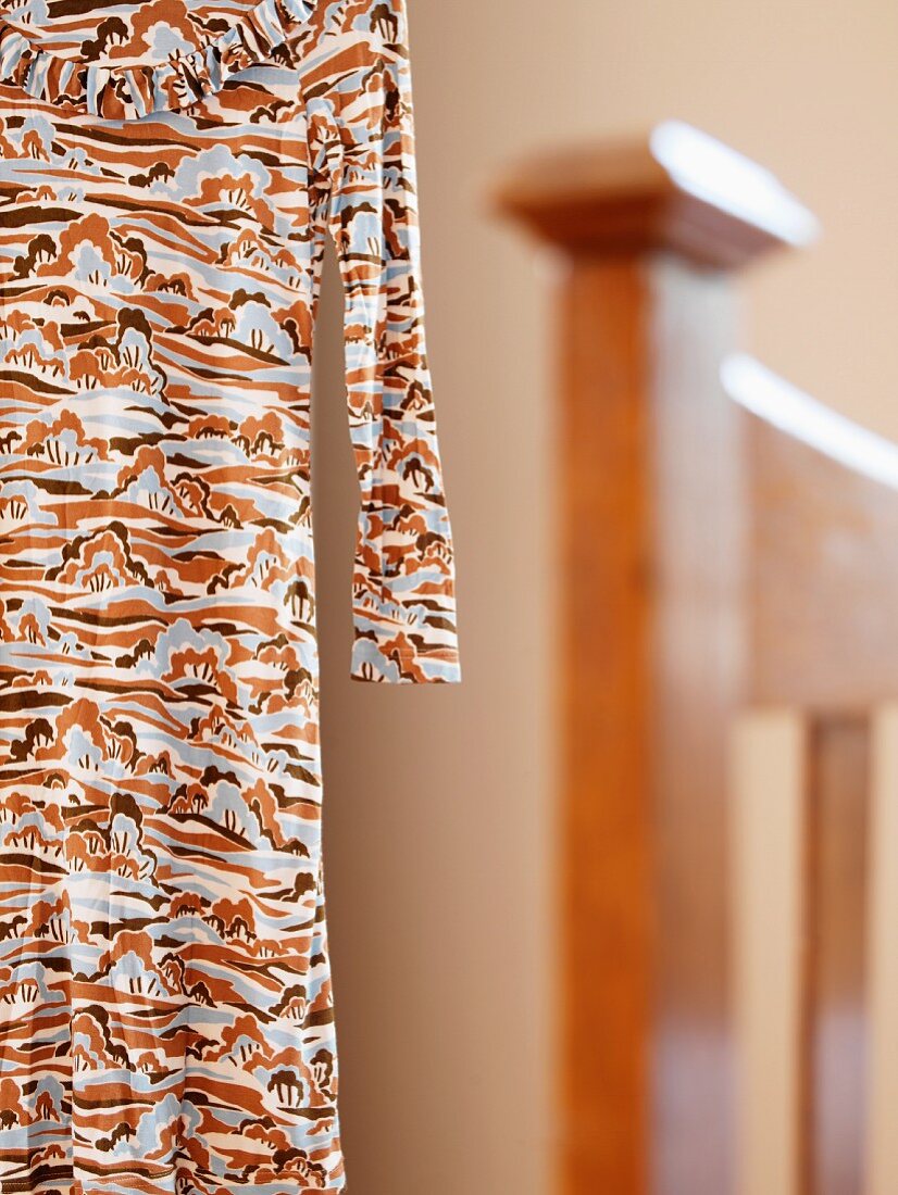 Dress with abstract pattern hanging up