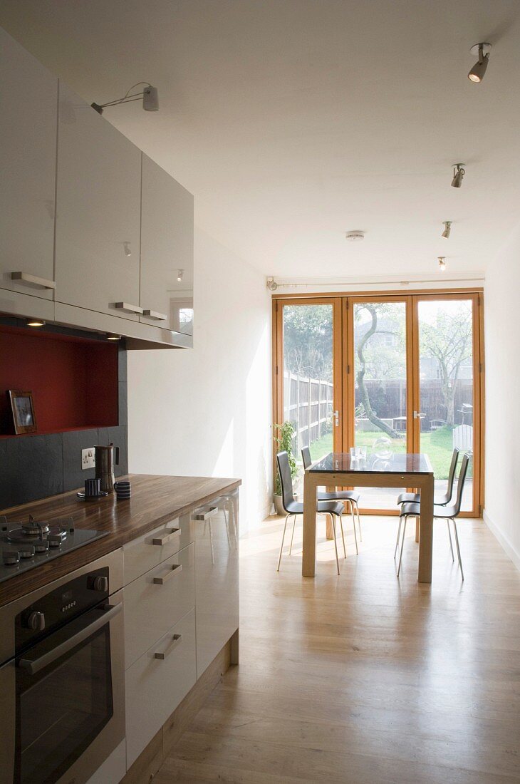 White kitchen with dining area