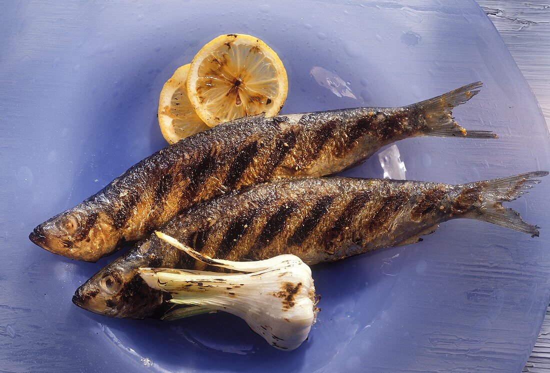 Two Whole Grilled Herring with Garlic and Lemon