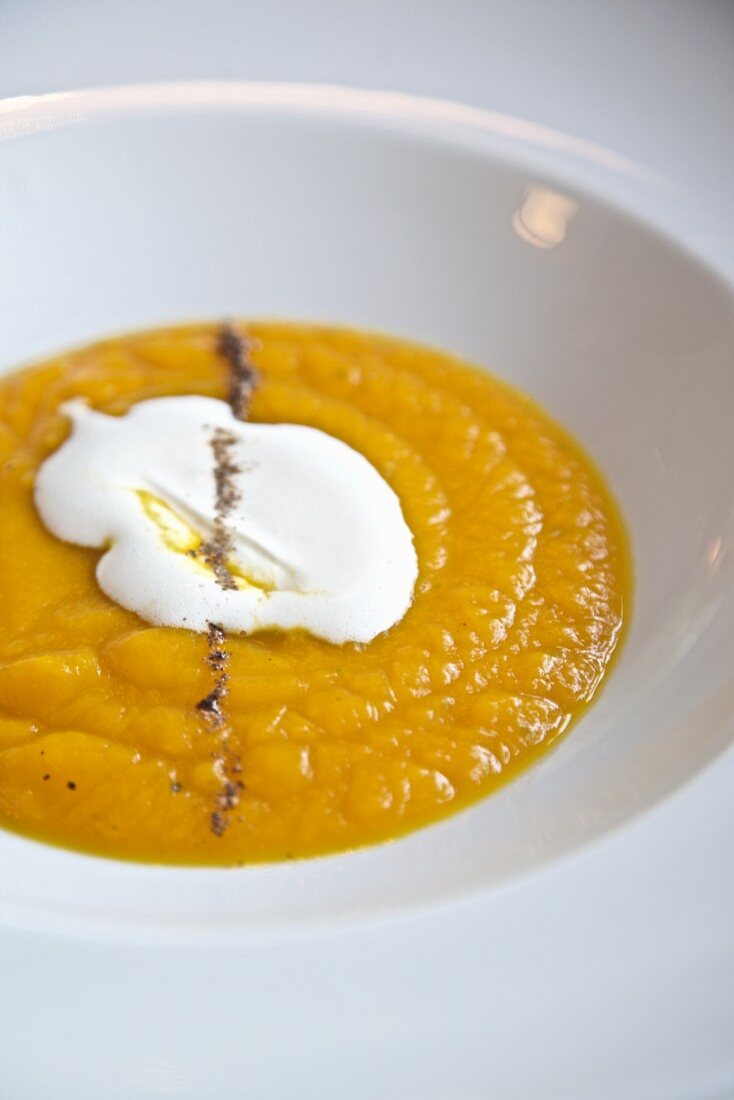 Bowl of Squash Soup with Creme Friache