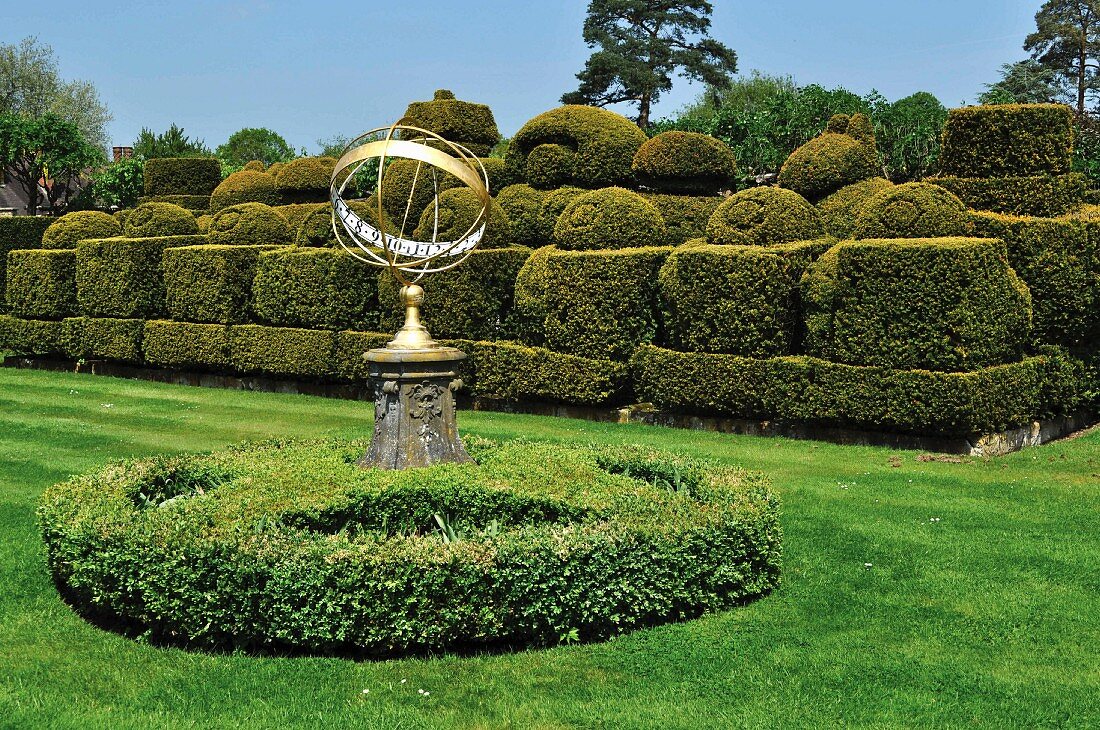 Chess pieces topiary in garden of Hever Castle, Kent, England