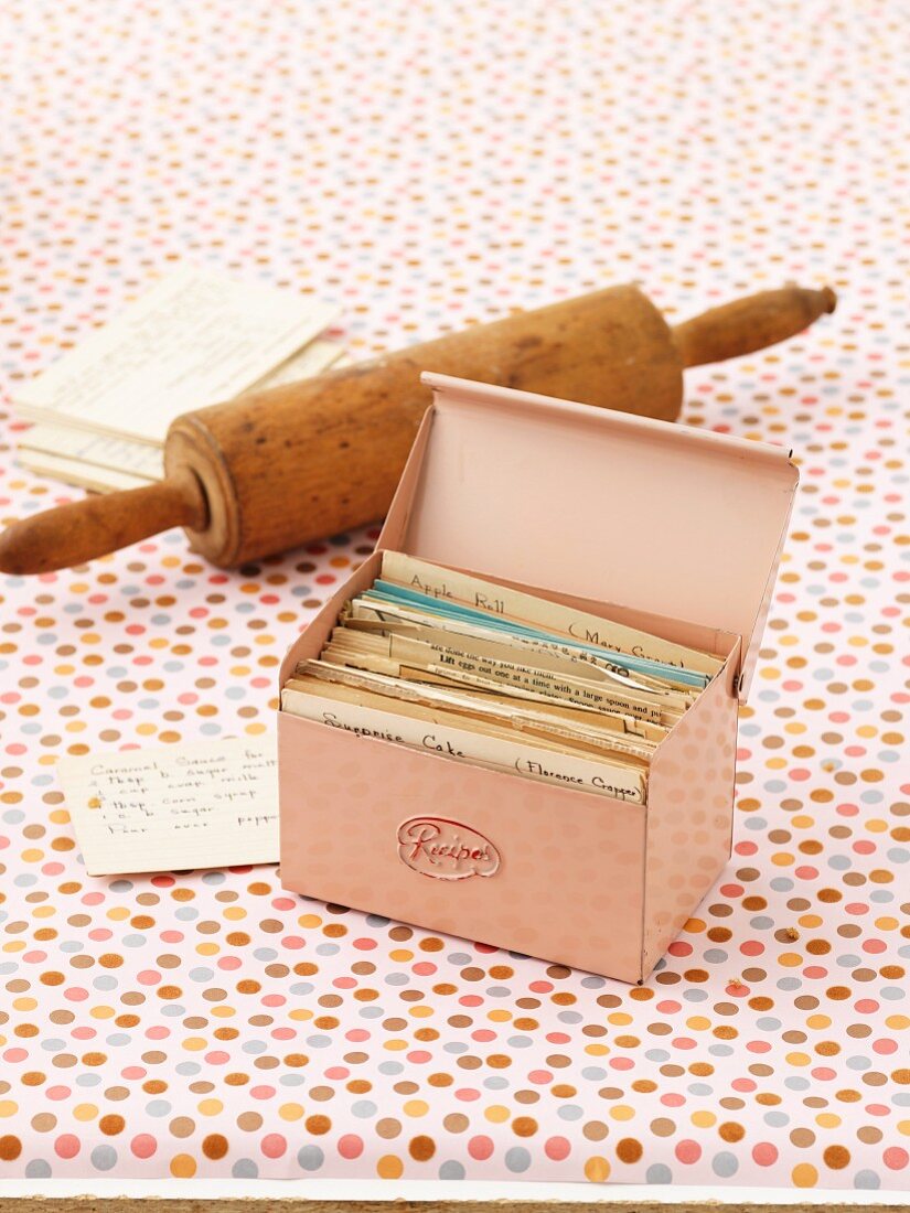 A recipe box and a rolling pin