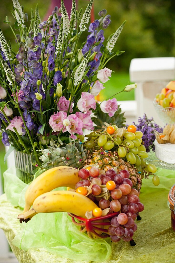 Fruit and flowers decorating table