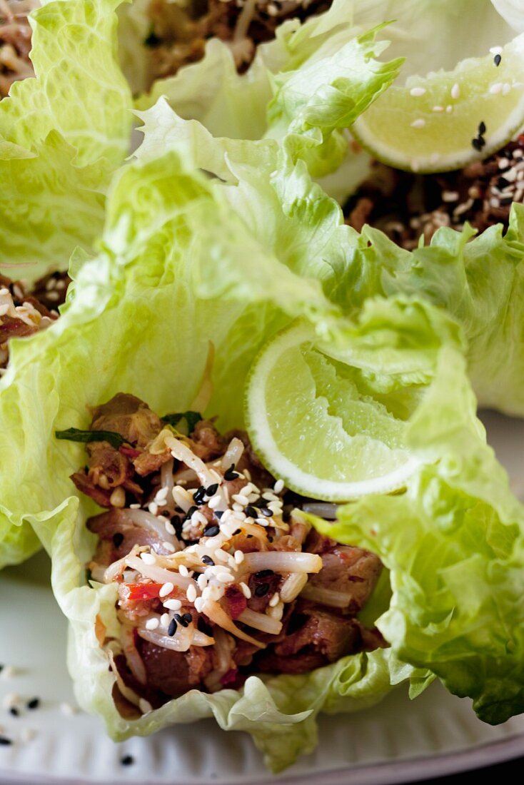 Chinese roast beef on lettuce leaves