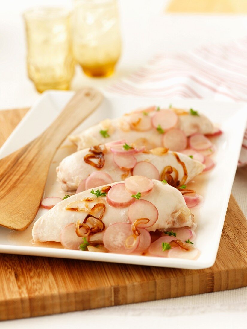 Poached chicken with radishes and onions