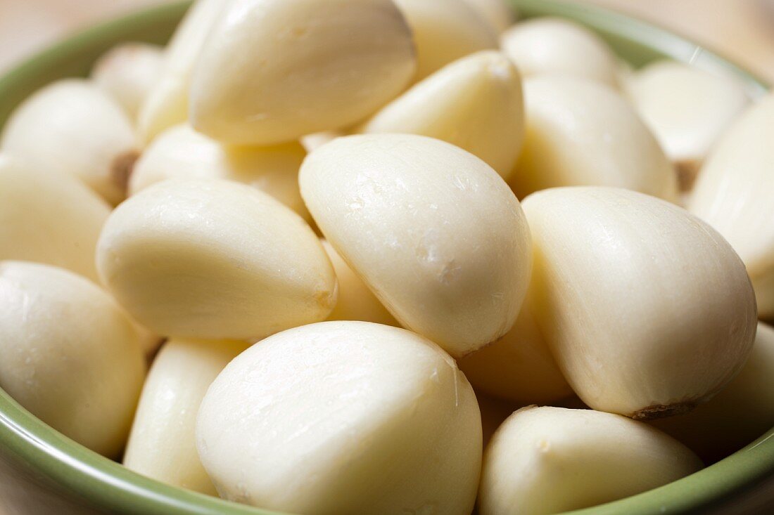 Bowl of Many Cloves of Peeled Garlic