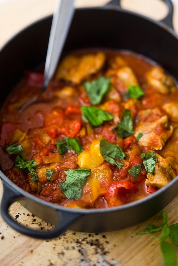 Chicken and pepper stew with basil