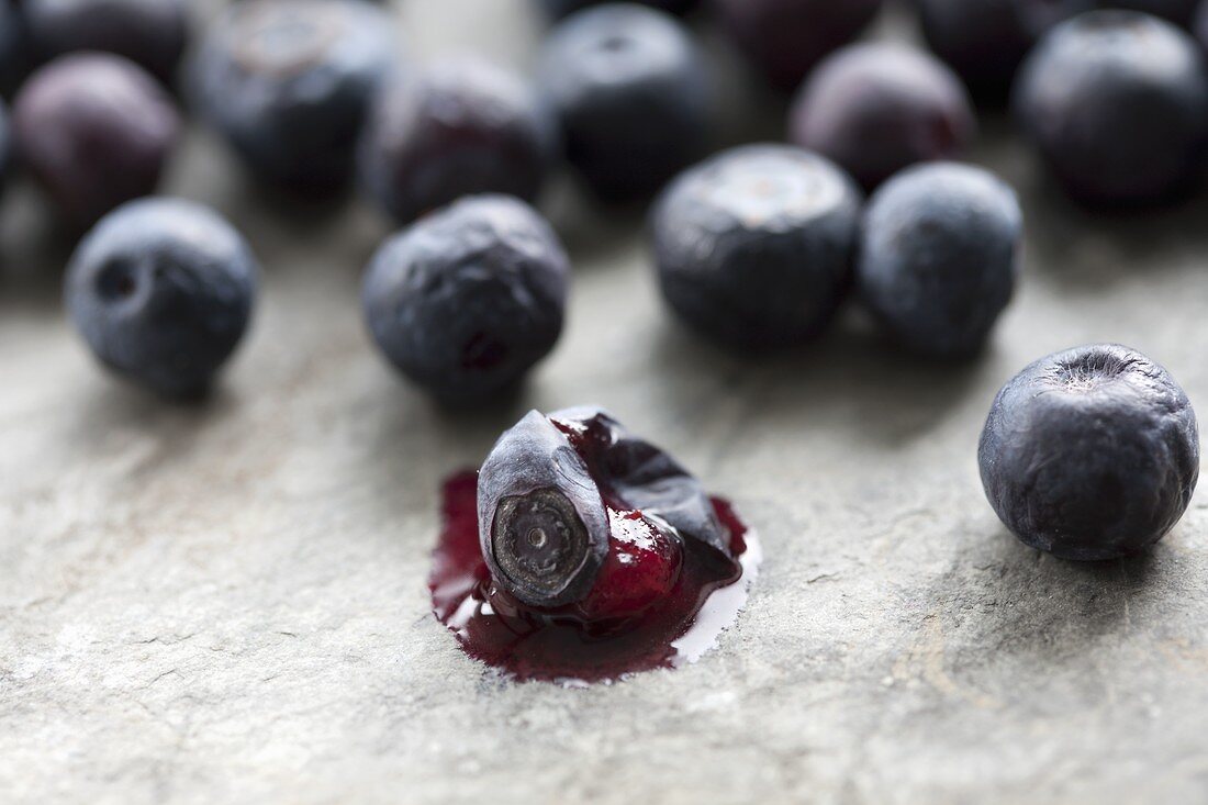 Blueberries, one squashed