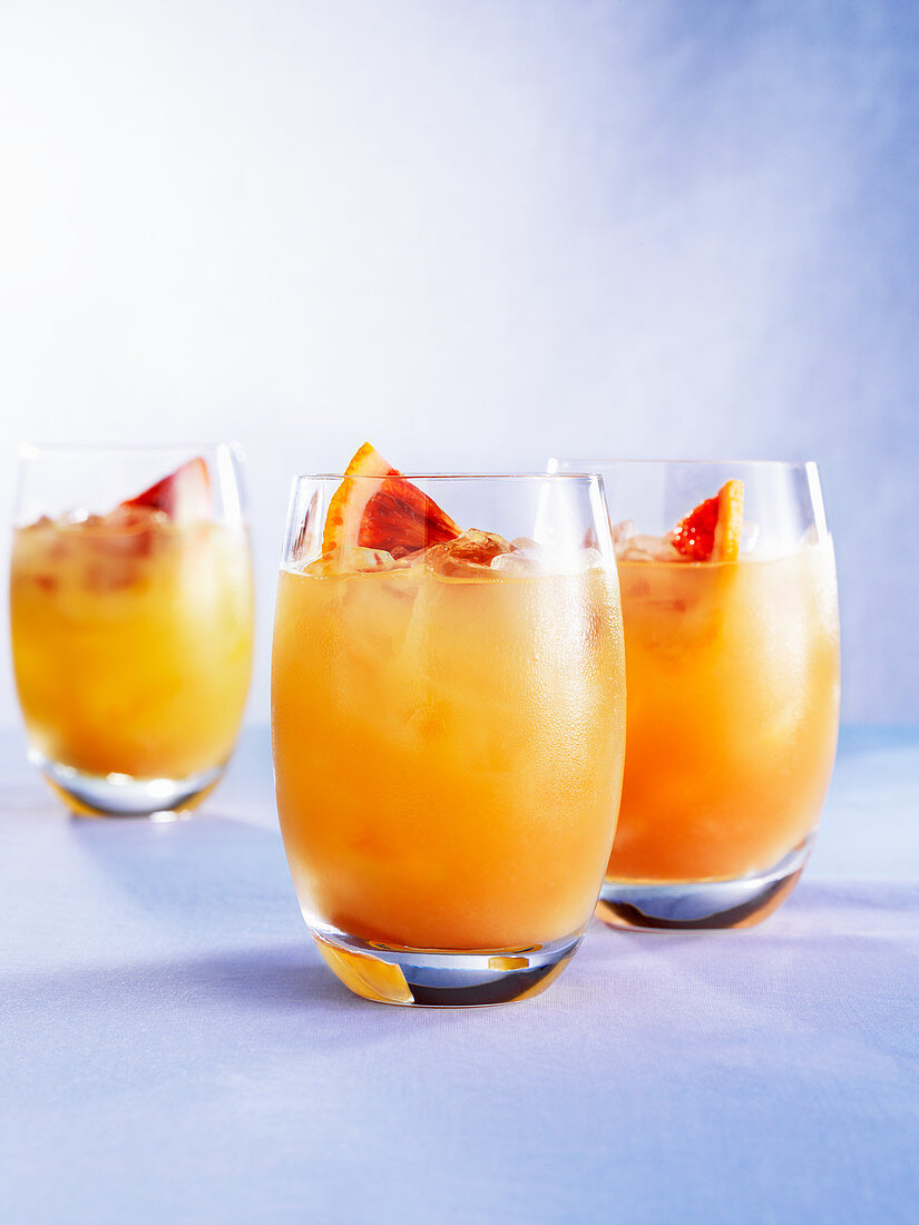 Malibu sunset (drink with rum, pineapple juice, orange juice & cranberry juice)