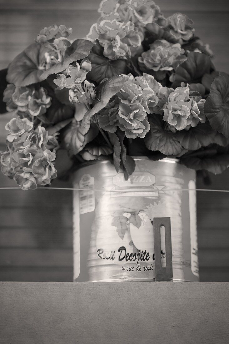 Tin can with bouquet