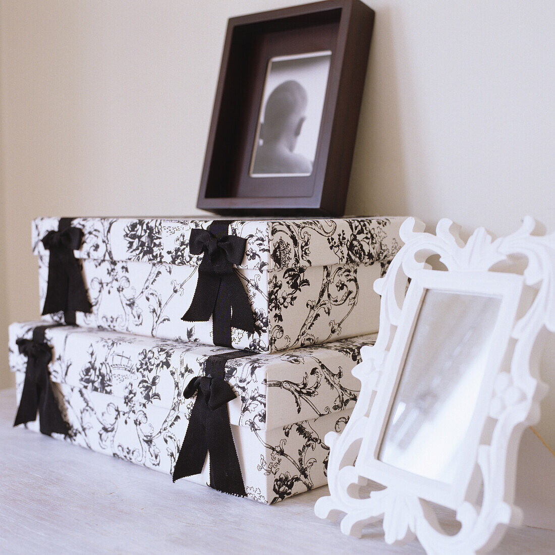 Decorative boxes with pattern in black and white and picture frame