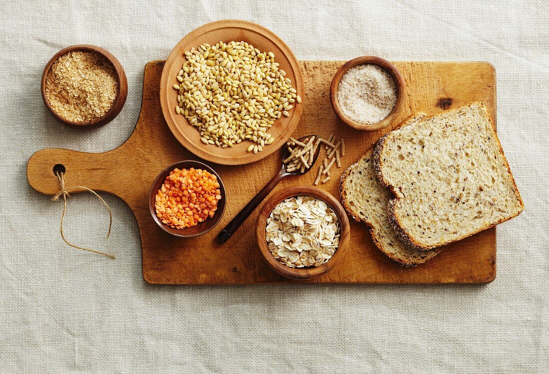Grains of corn, lentils, oats and wholemeal bread