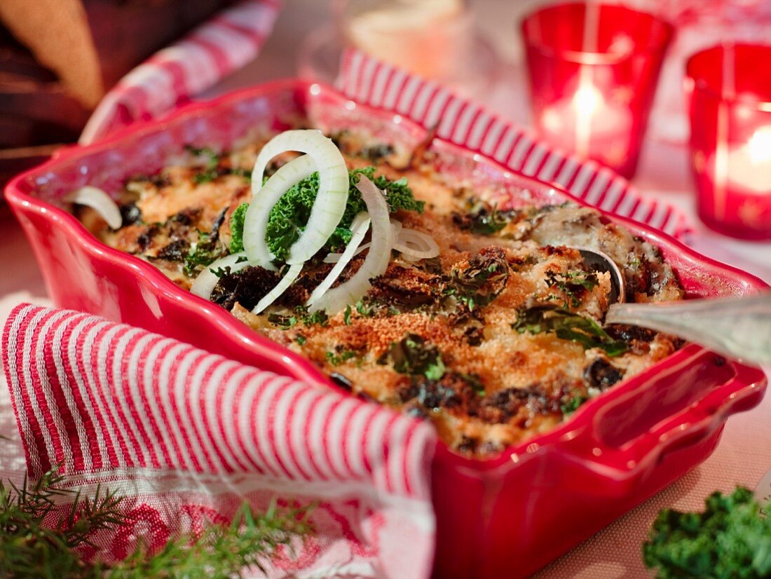 Potato bake with green cabbage and anchovies for Christmas dinner