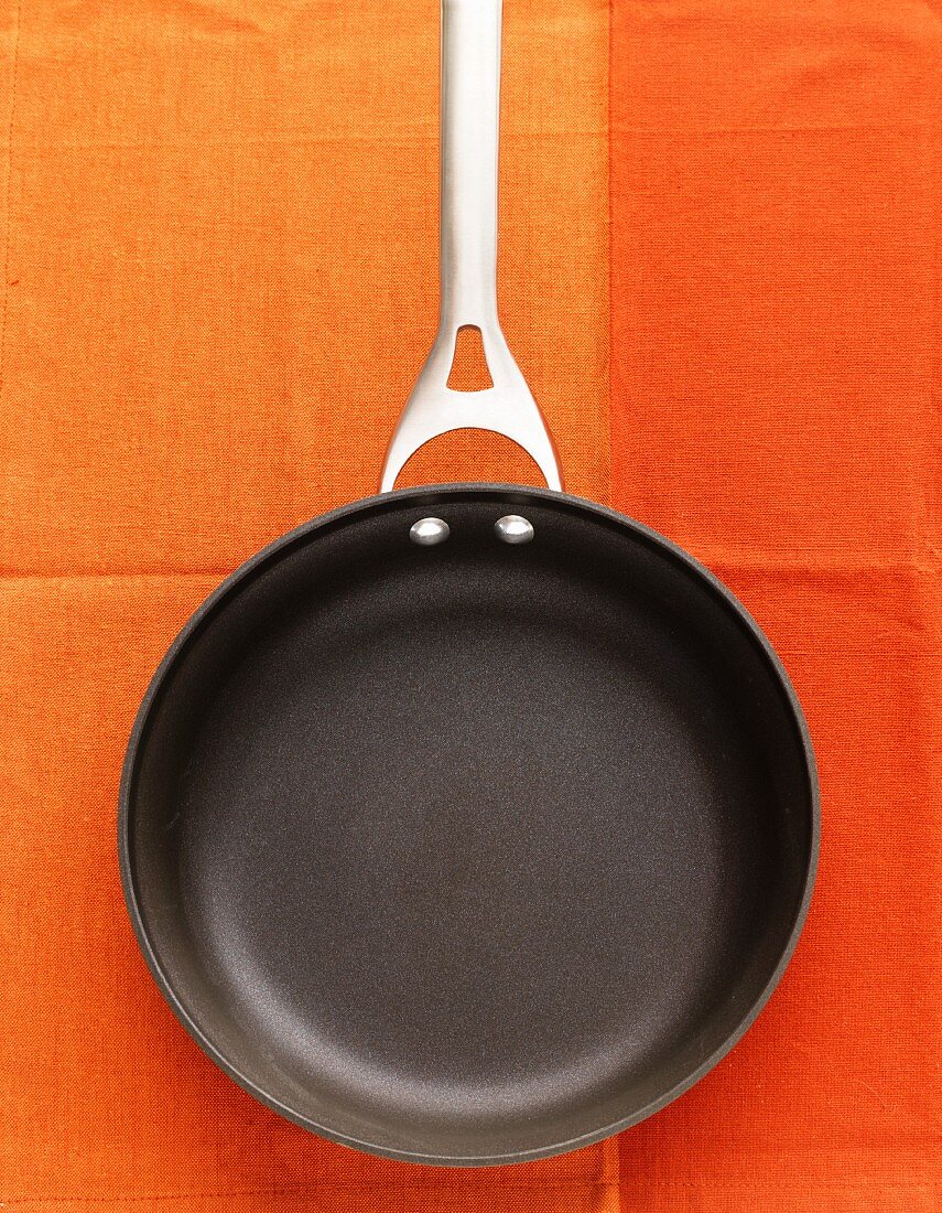 An empty frying pan, seen from above