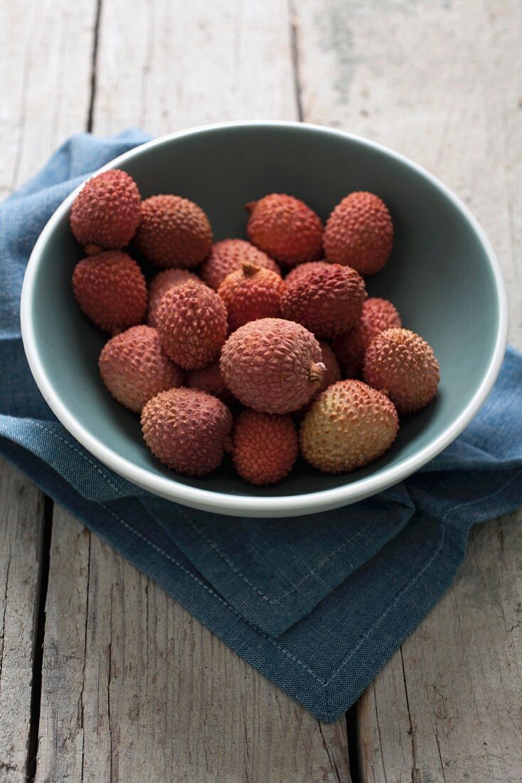 A bowl of lychees