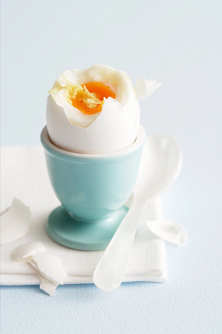 A soft-boiled egg in an egg cup