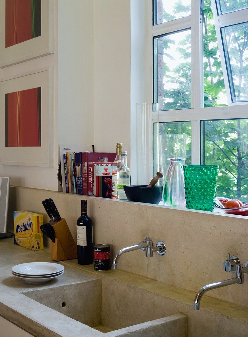 Kitchen sink with various utensils